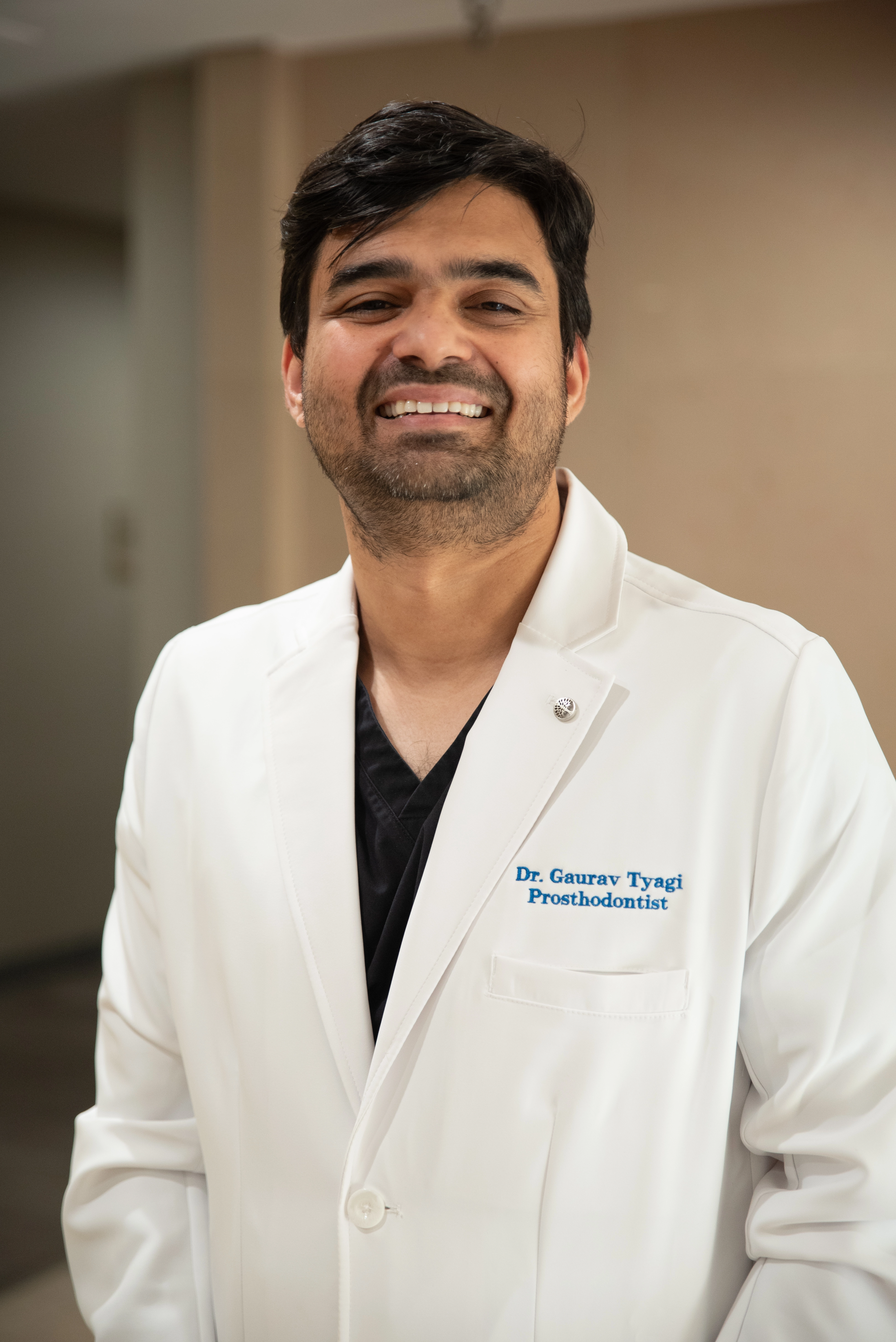 Our dentist in Dallas, TX, Dr. Gaurav Tyagi, smiling for a picture.