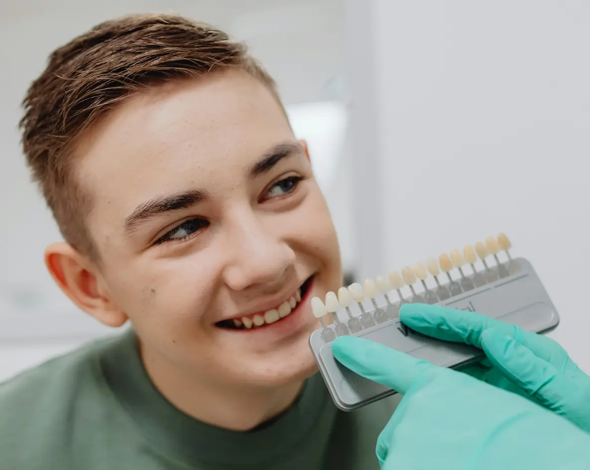 Boy choosing teeth whitening treatment